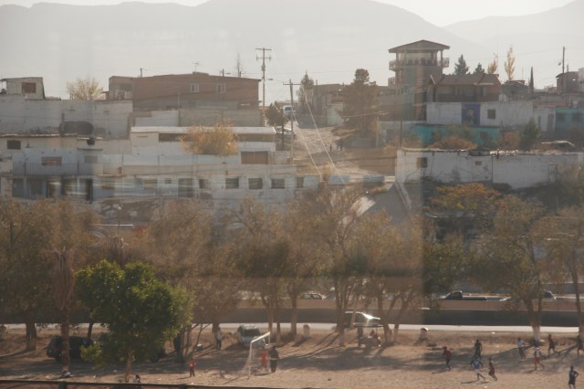 Kids playing soccer in Juarez, Mexico